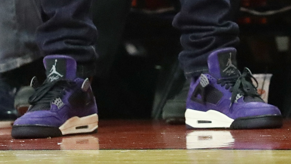 purple jordan 4 travis