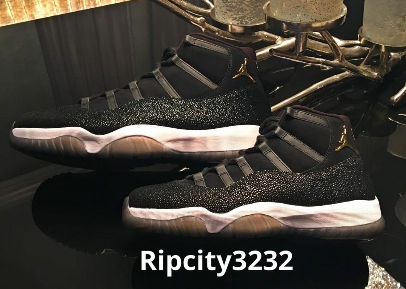 jordan 11s black and gold