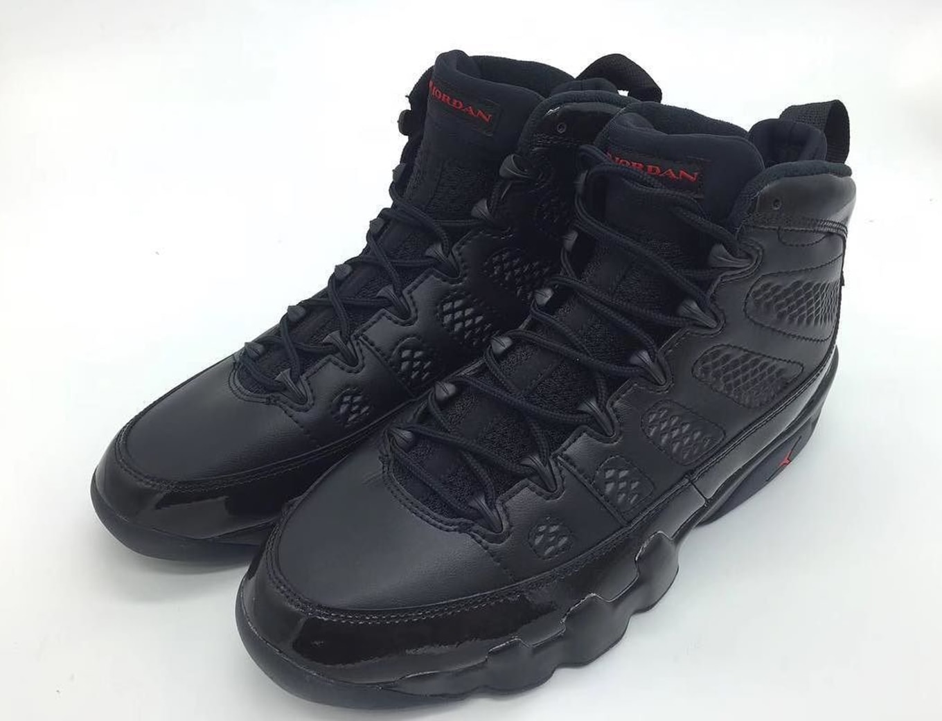 all black jordan 9s