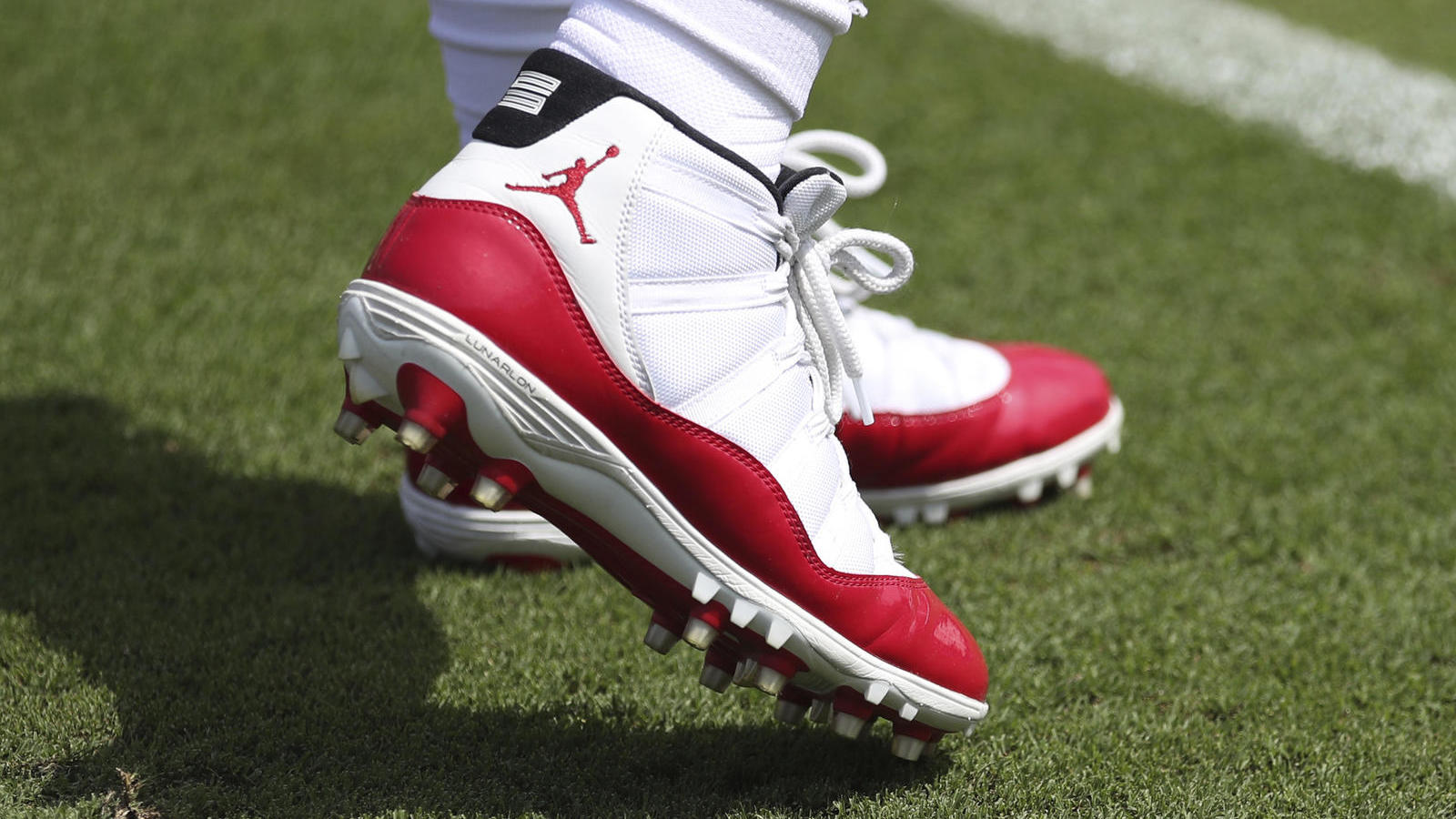 jordan 11 football cleats on feet