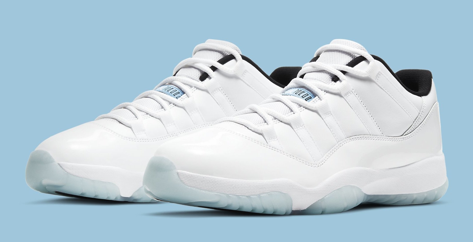 blue and white low top jordans 11