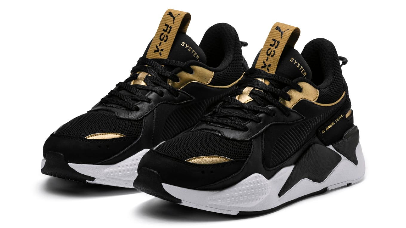 black white and gold pumas