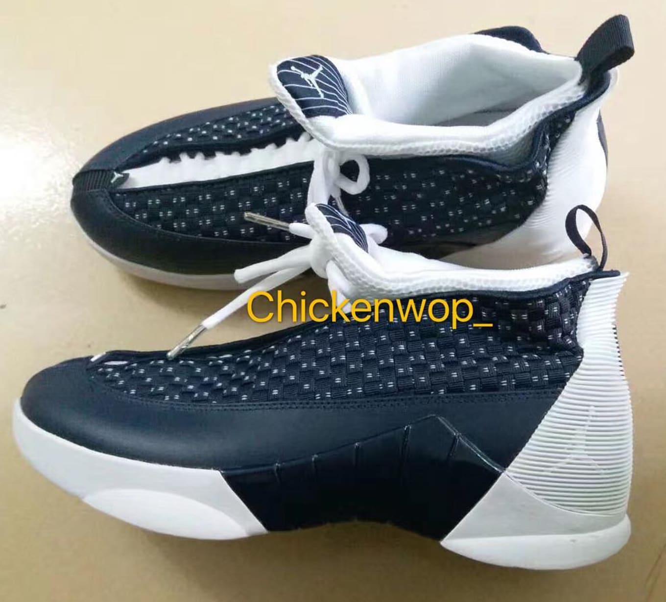 black and blue jordan 15