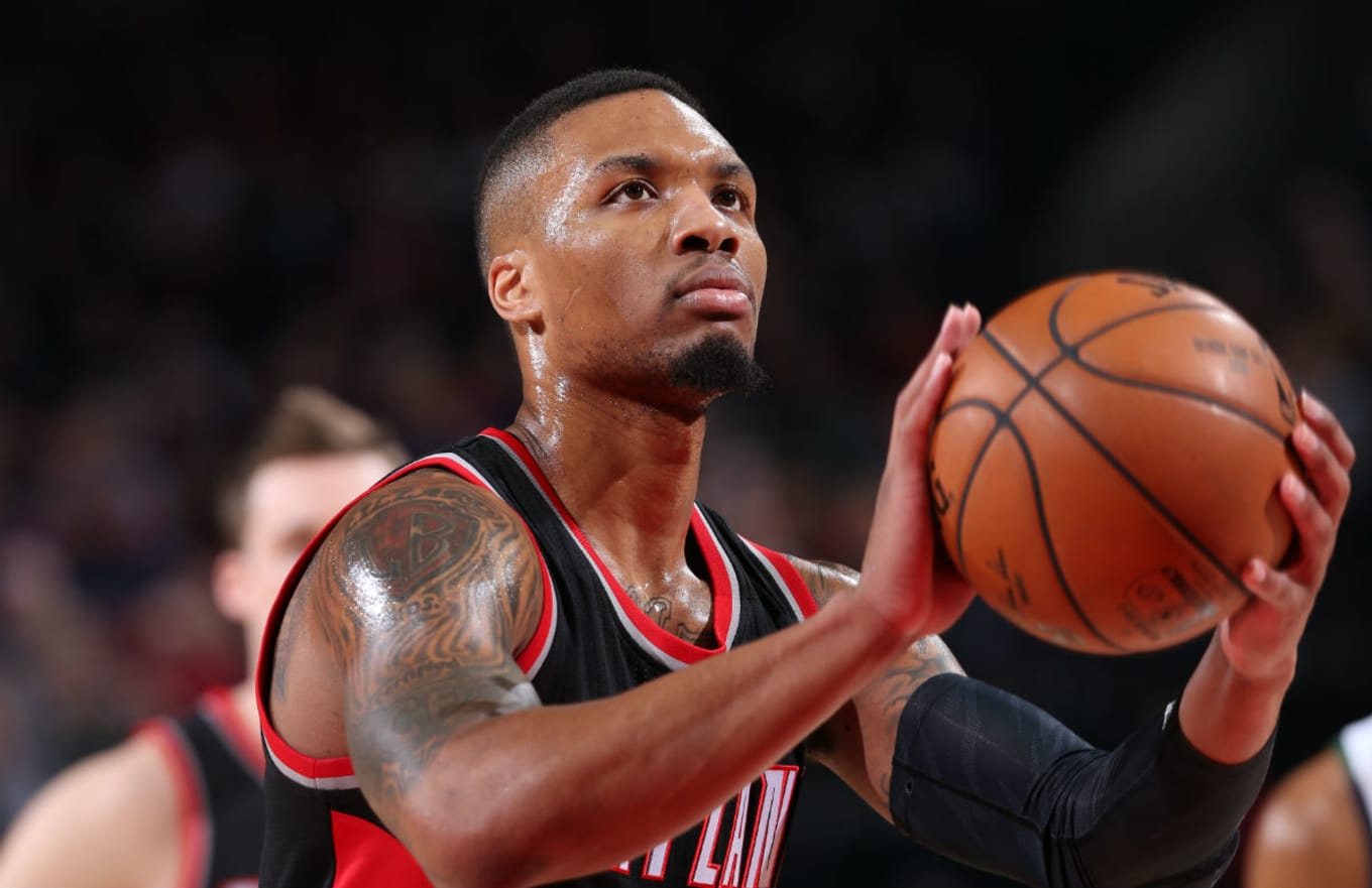 damian lillard wearing dame 4