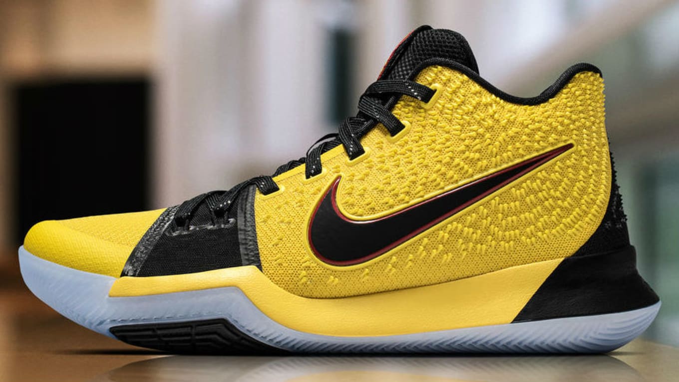 black and yellow kyrie shoes