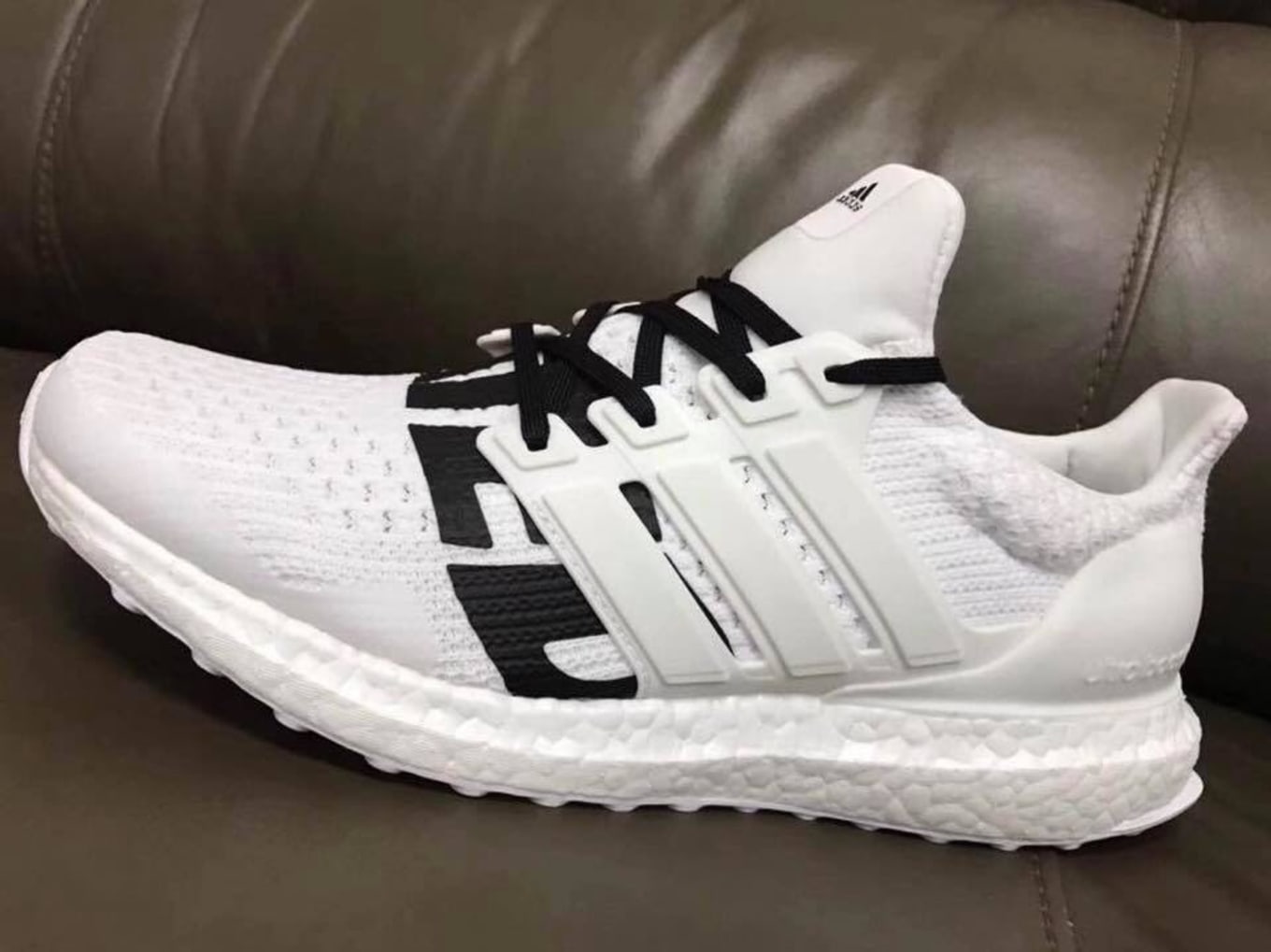 undefeated ultra boost white