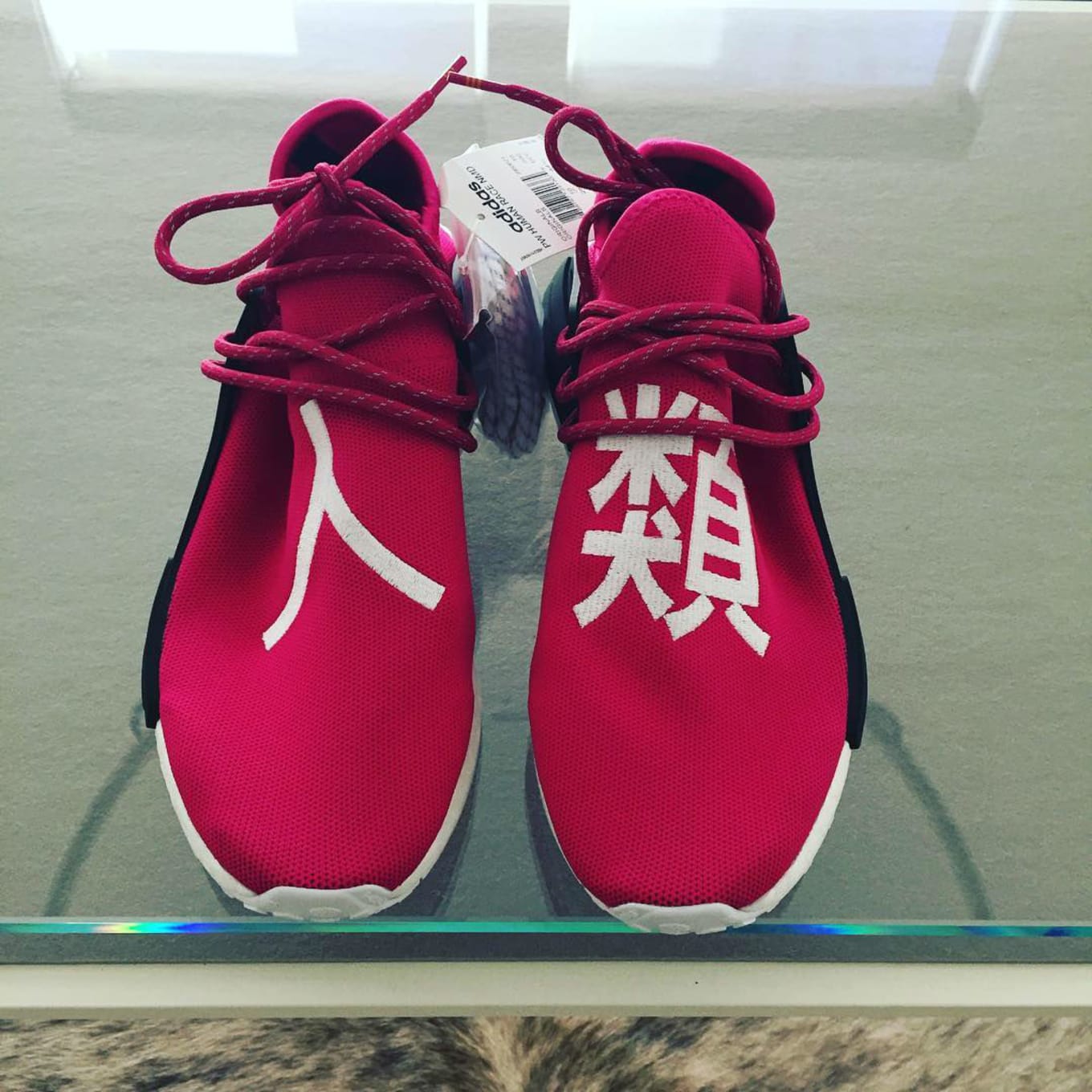 pink pharrell adidas human race