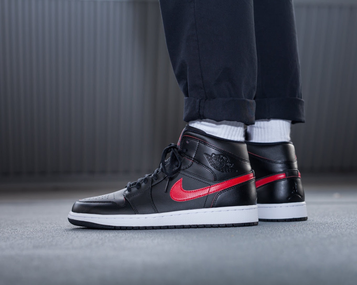 Jordan 1 black with red swoosh