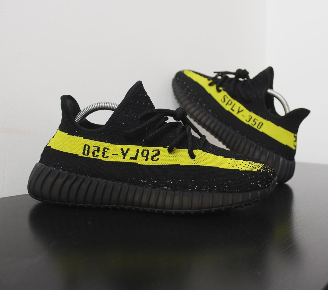 yellow and black yeezys