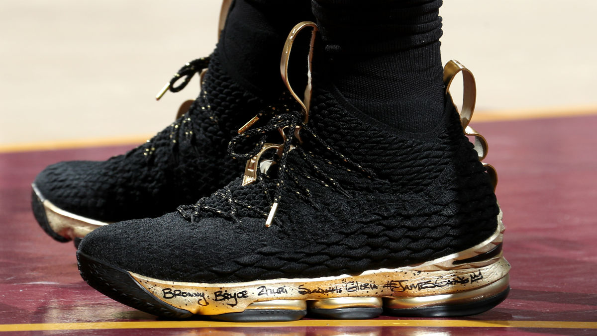 black and gold lebrons 15
