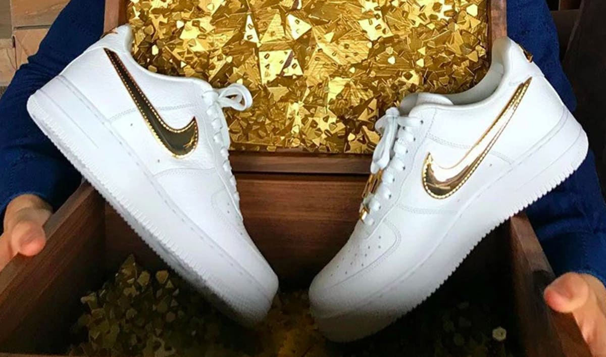 solid gold nike shoes