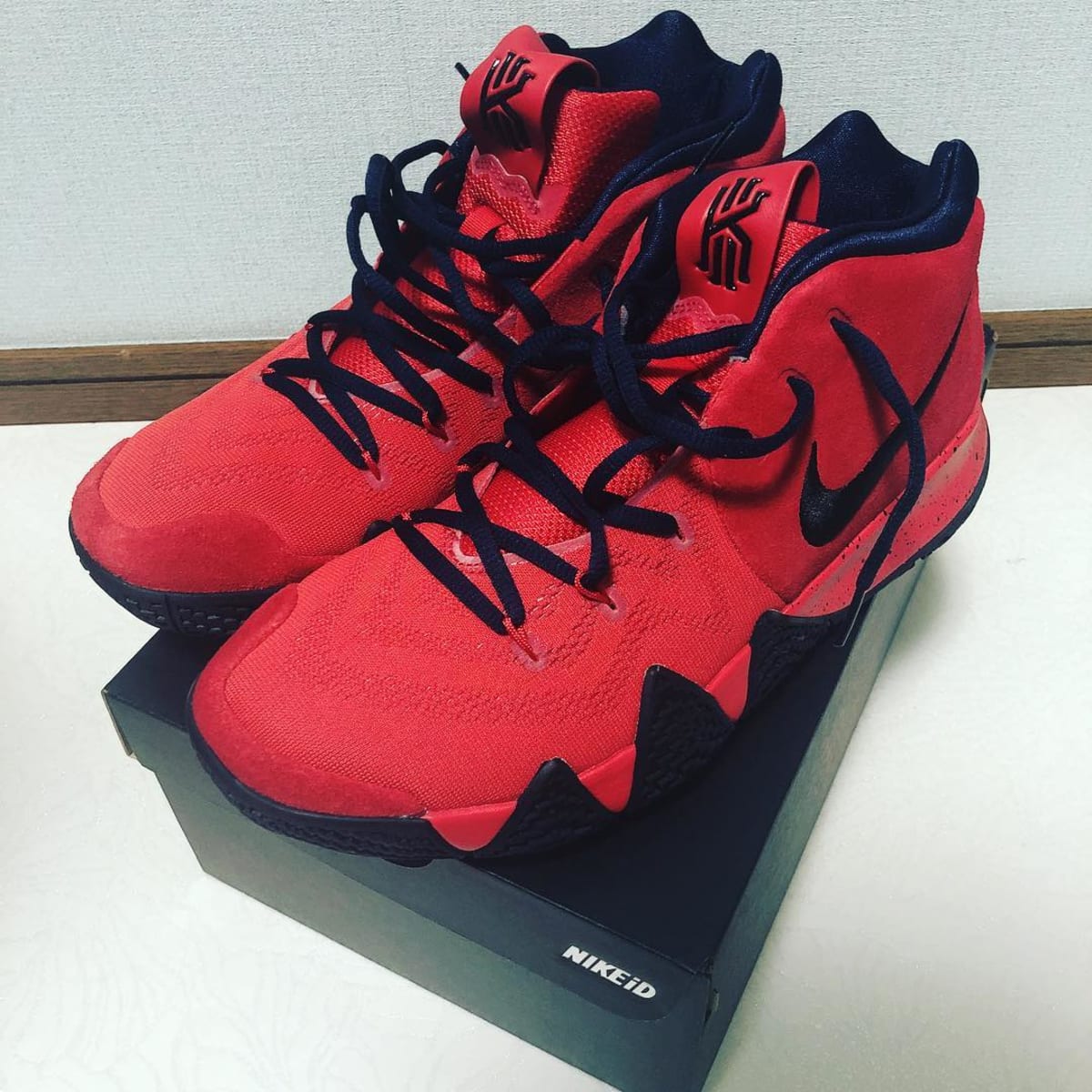 kyrie shoes red and black