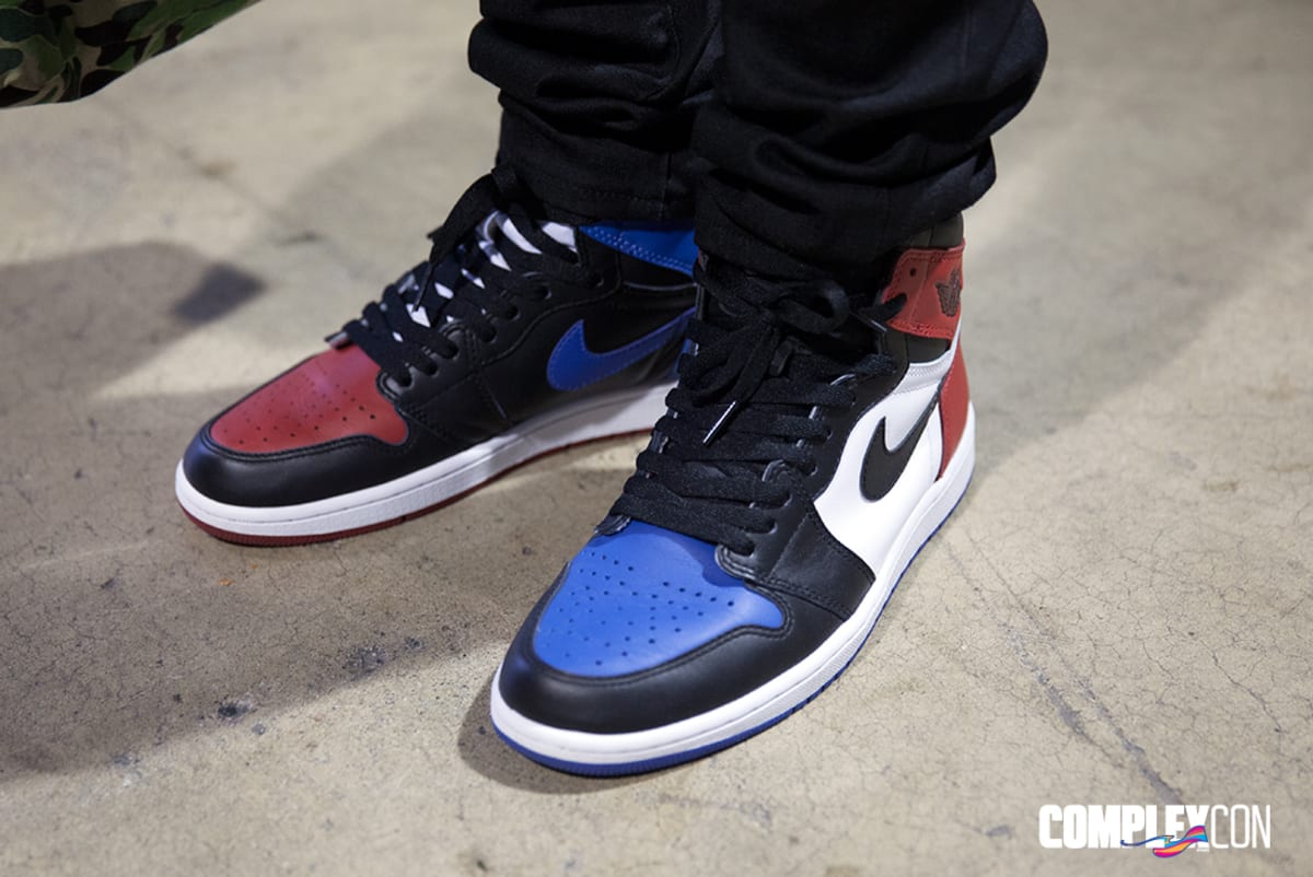 two different colored jordan shoes