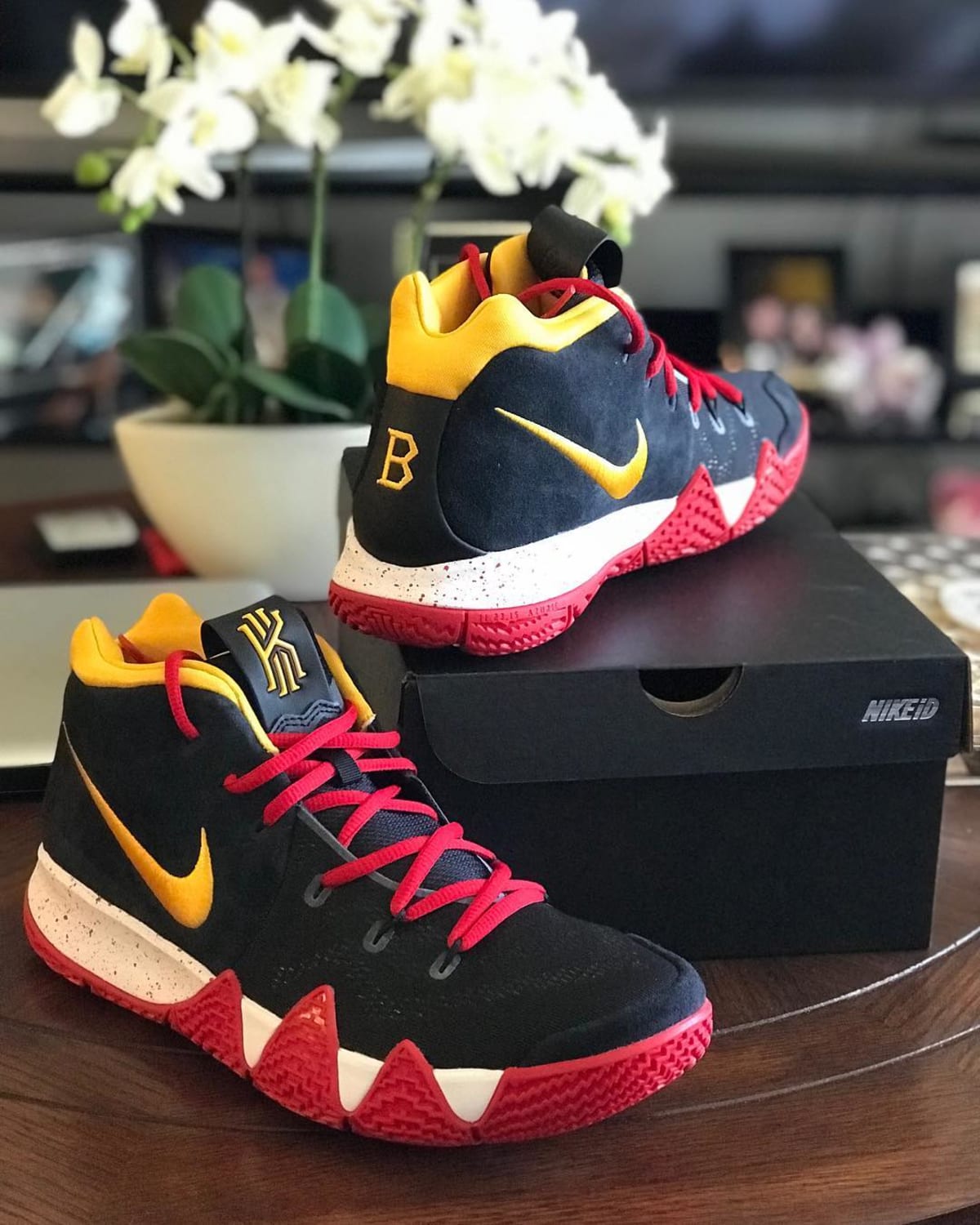 kyrie 4 black and gold