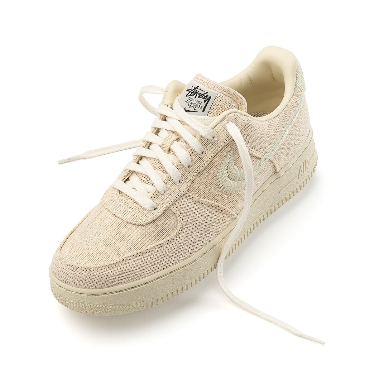 tan stussy af1