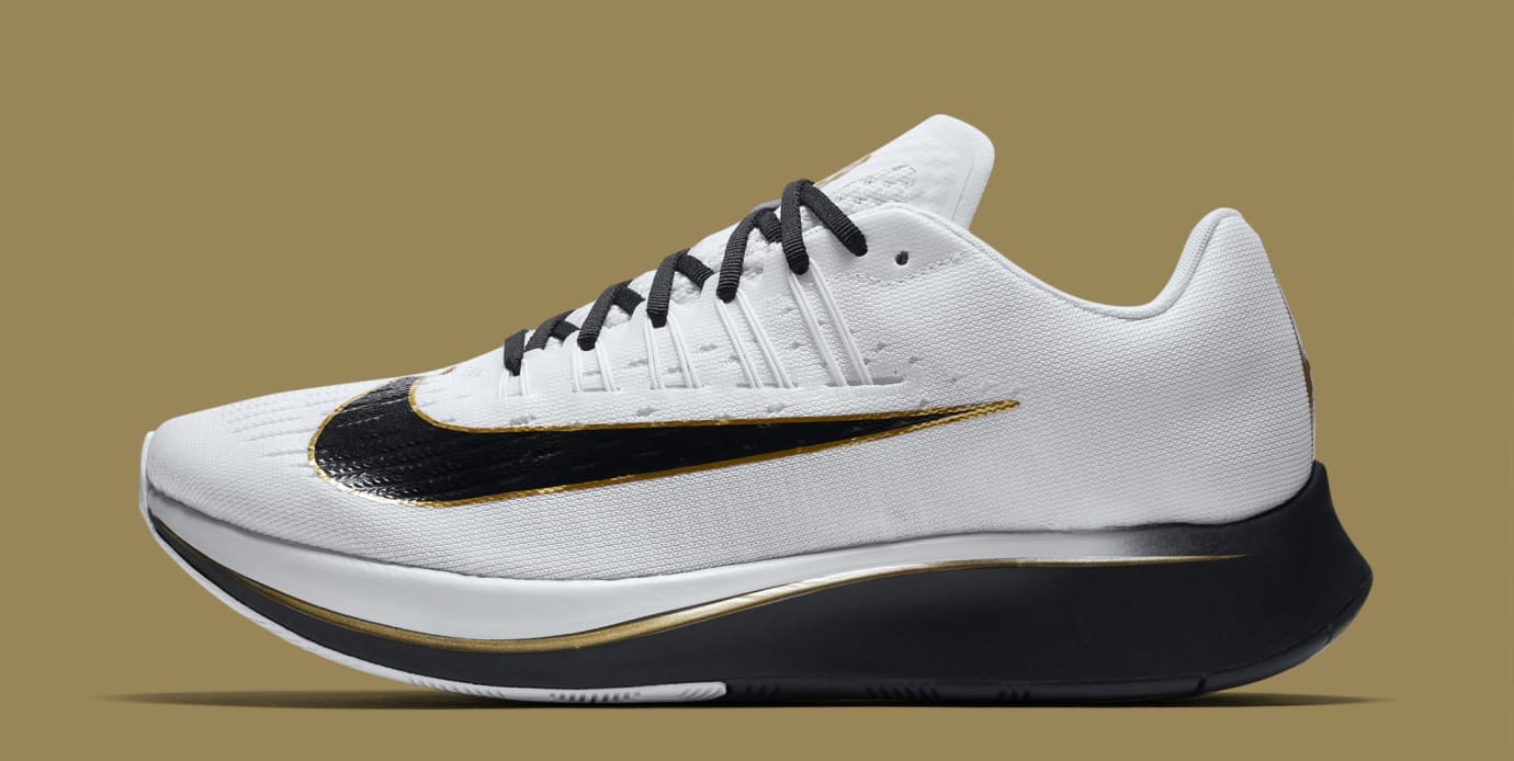 nike zoom fly black white gold