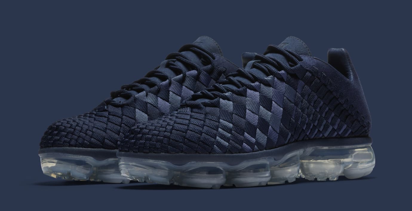 white and navy vapormax