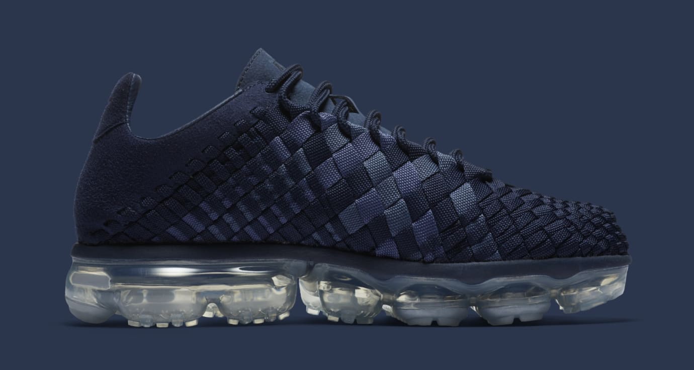 white and navy vapormax