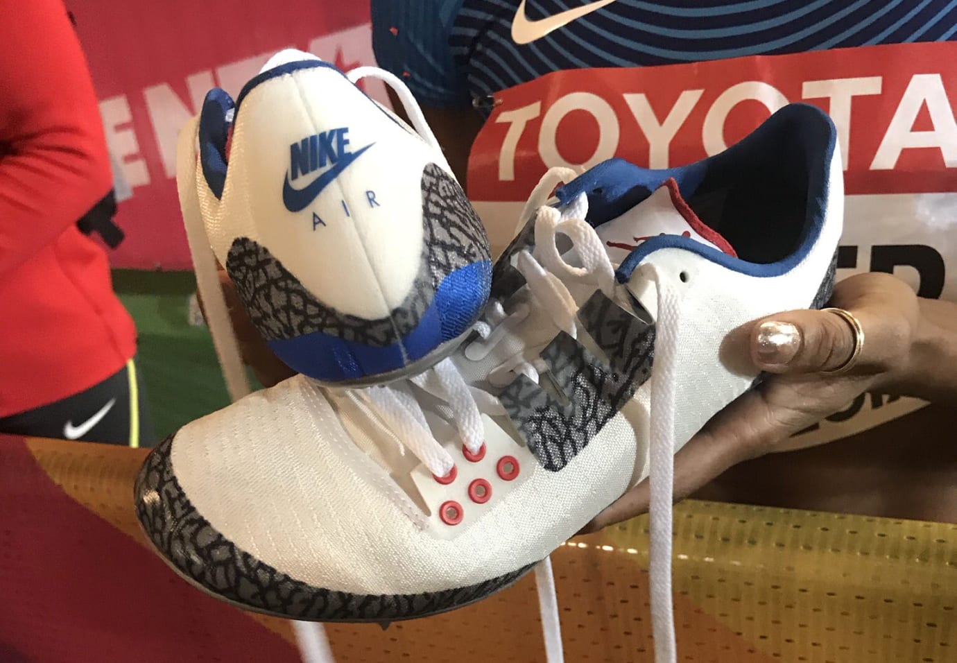 blue and gold track spikes