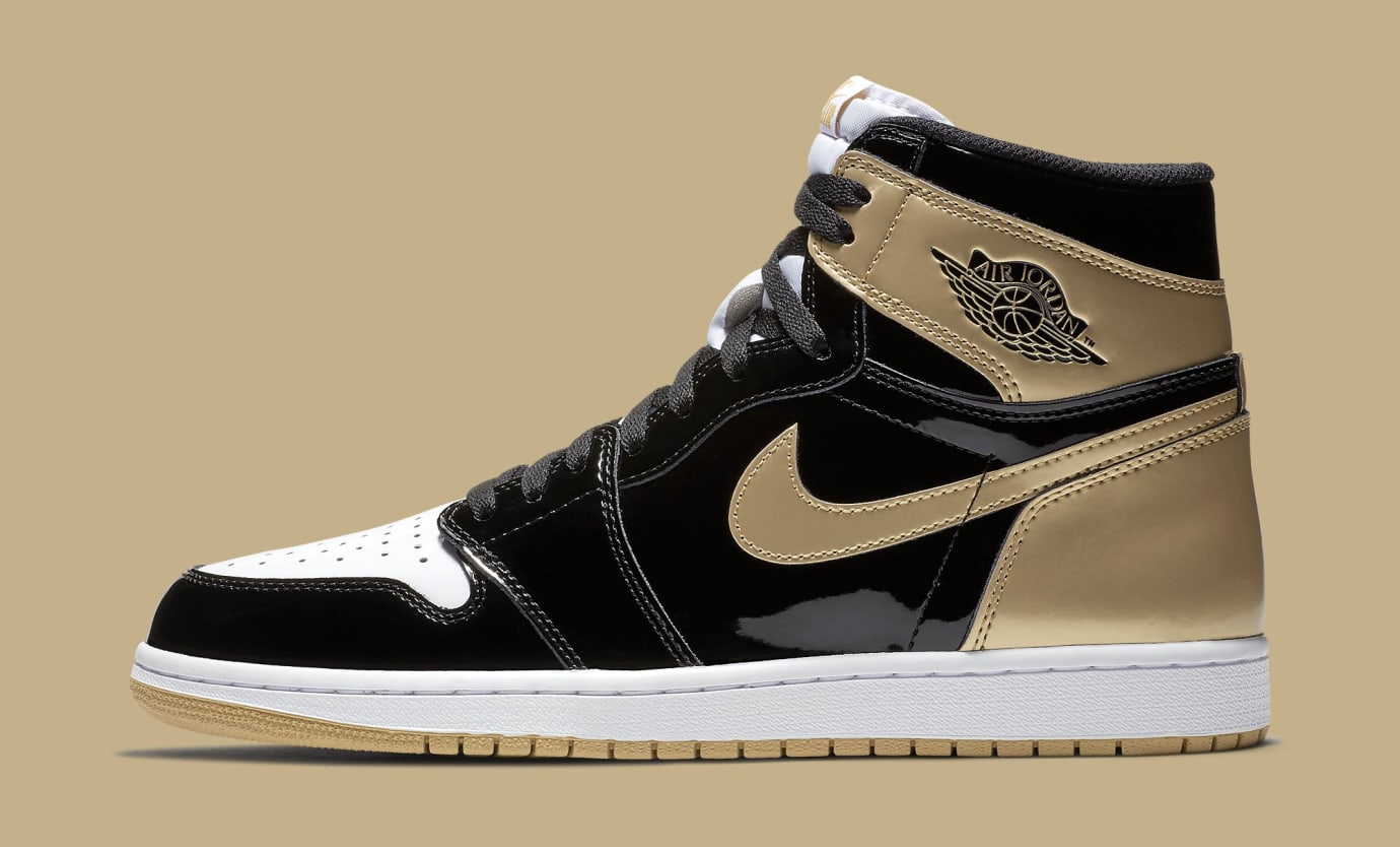 black and gold low top 1s