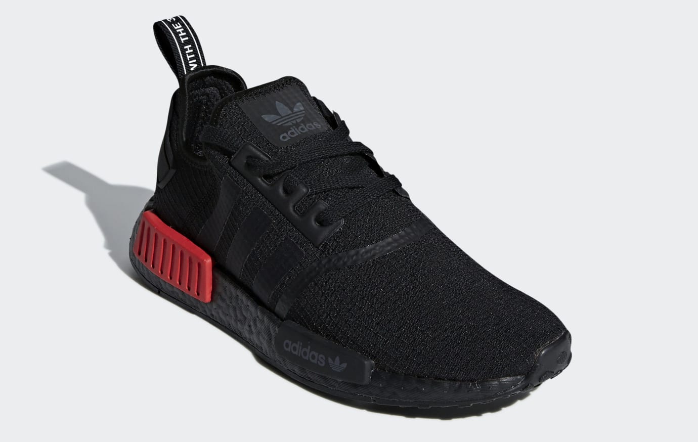 adidas nmd black with red bottom