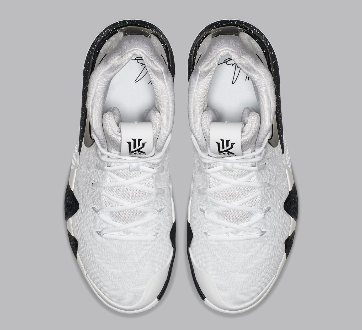 kyrie 4s white and black