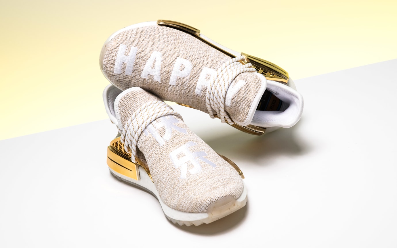 nmd human race gold