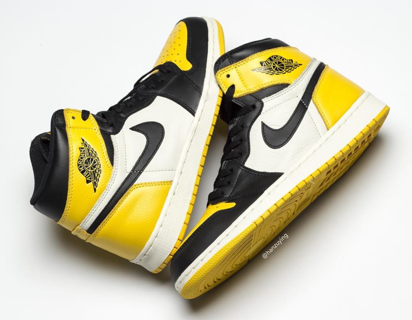 jordan 1s black and yellow