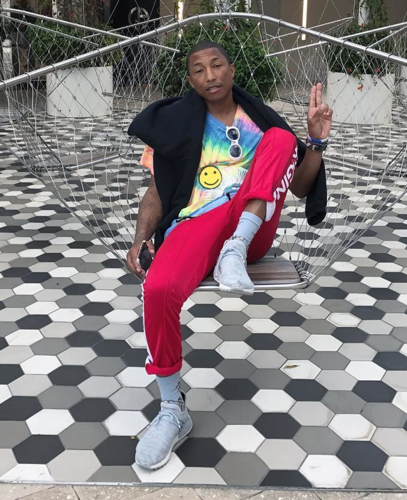 Pharrell wearing the BBC-exclusive 'Clear Grey' Adidas Human Race NMD TR