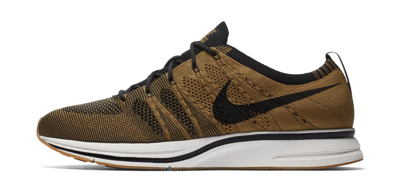 nike beige and black trainers