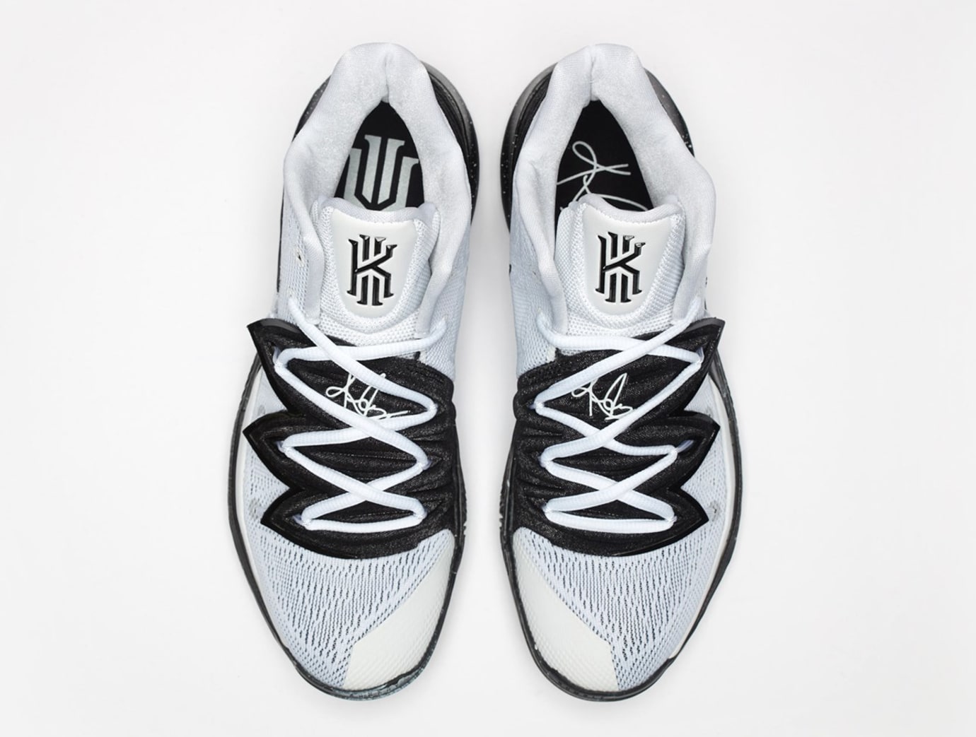 kyrie white and black shoes