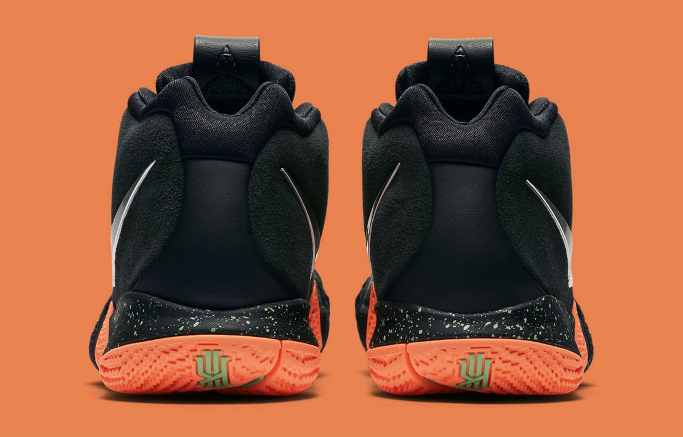 kyrie 4s black and orange