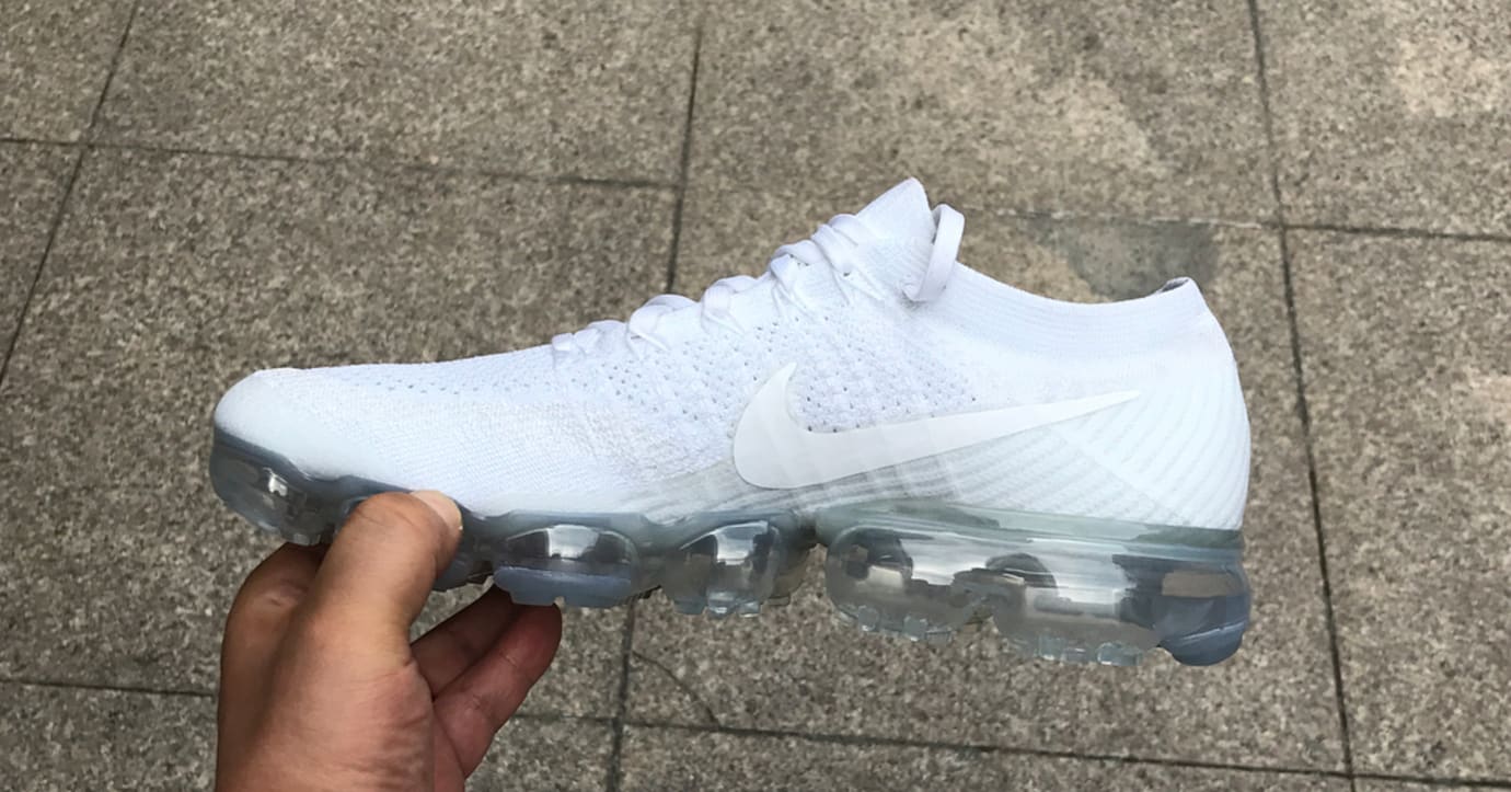 triple white vapormaxes