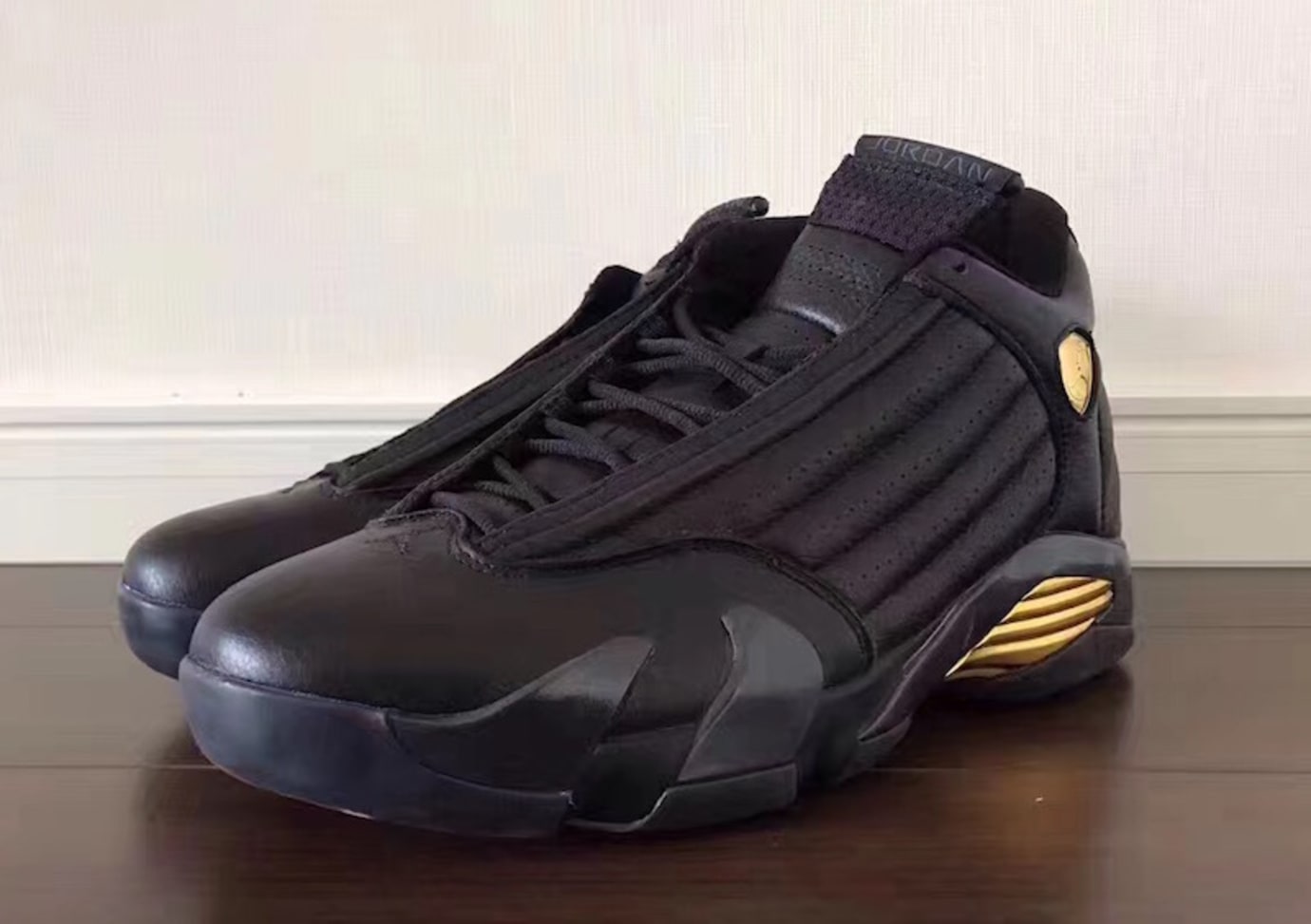 jordan 14s black and gold