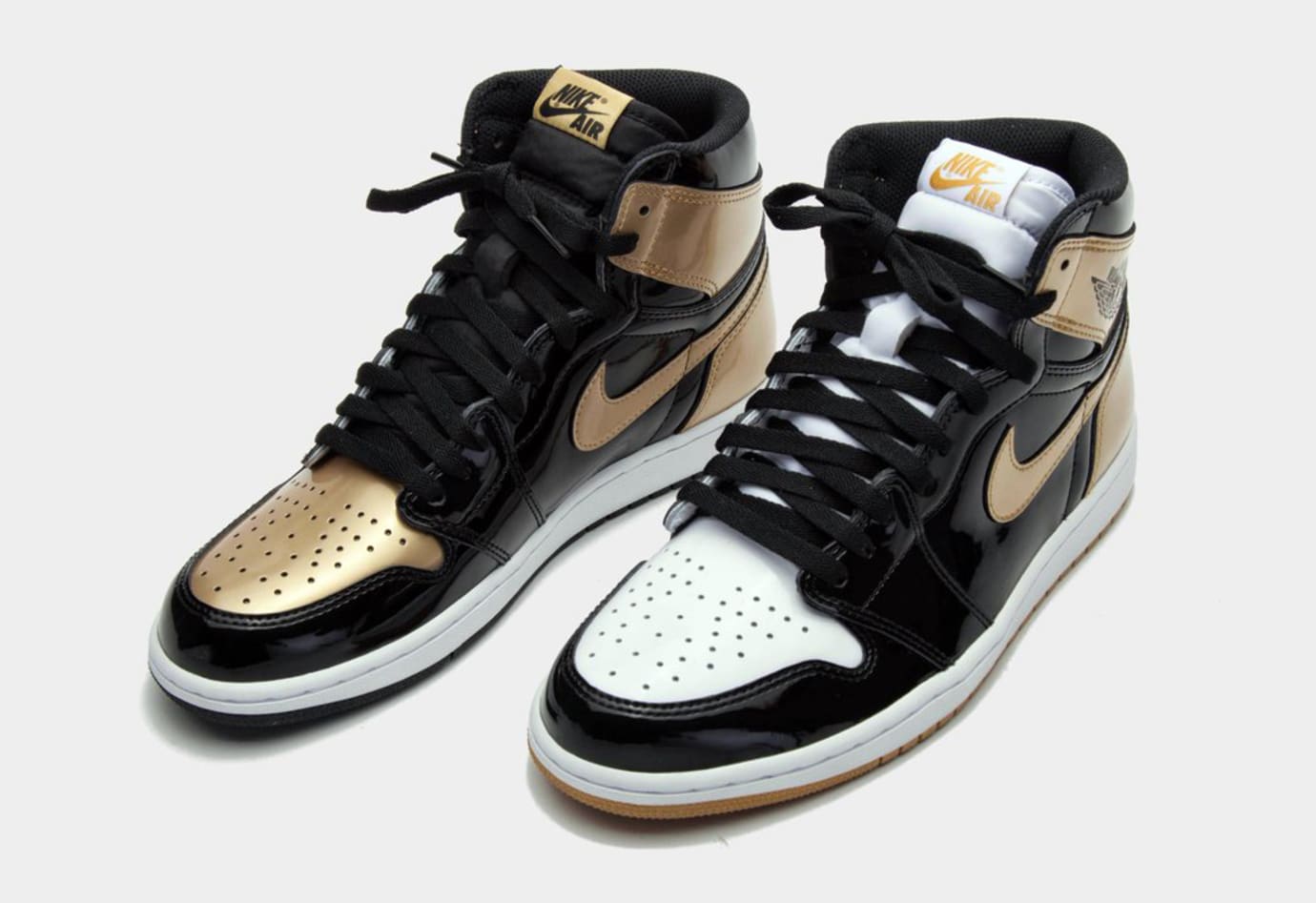 gold air jordan 1s