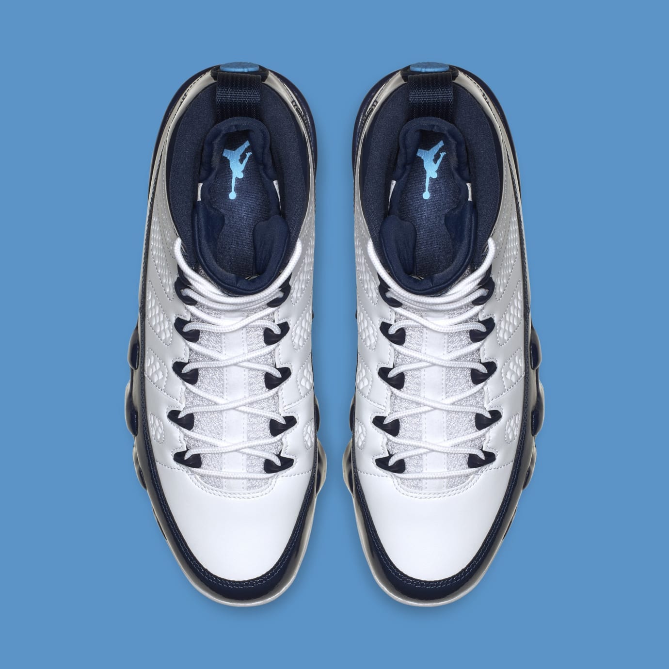 navy blue and white jordan retro 9