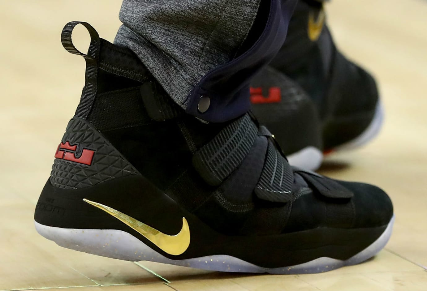 lebron james nike black and gold