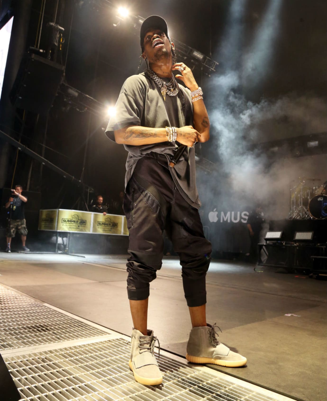 Travis Scott takes a shot at Adidas in 