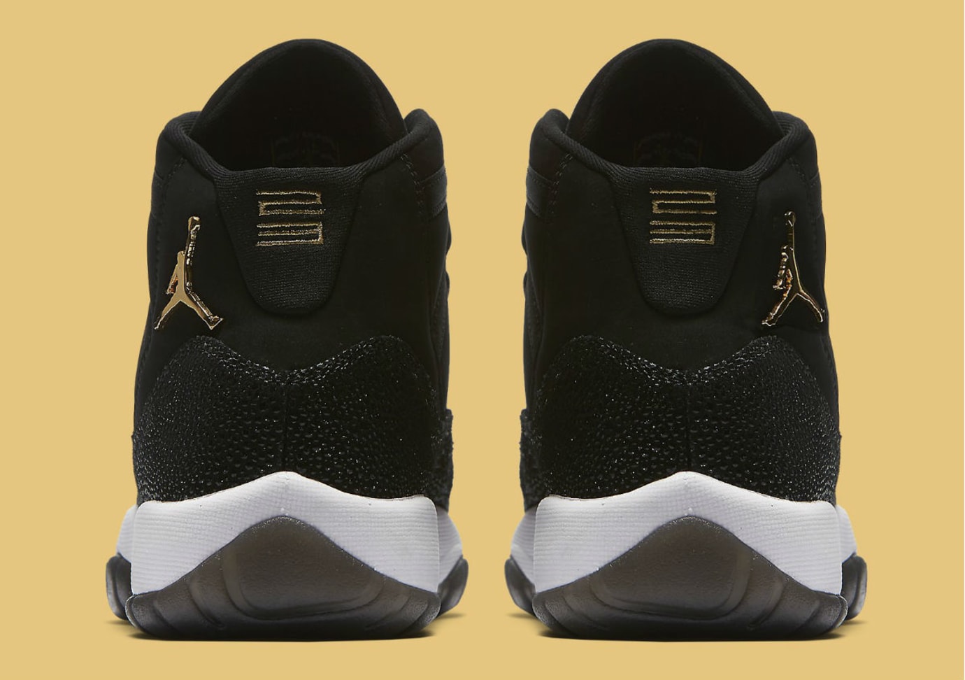 black and gold jordans 11