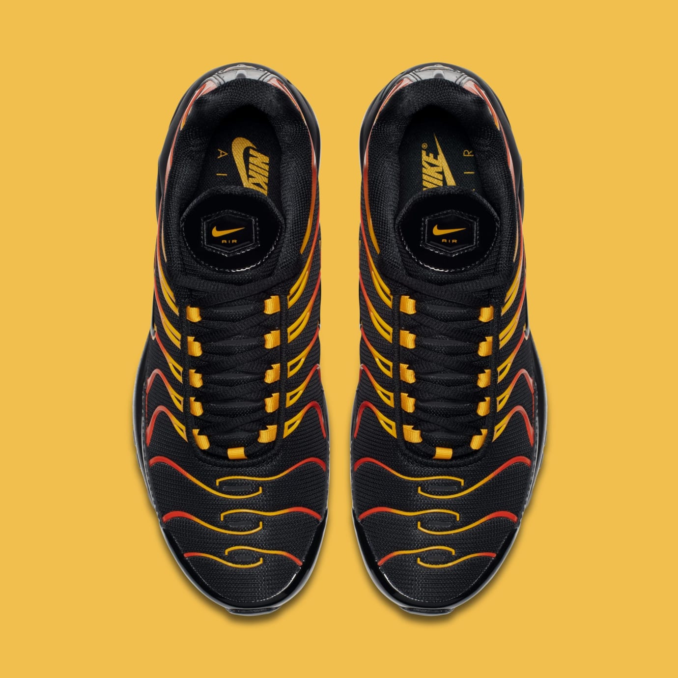 black and yellow air max 97 plus