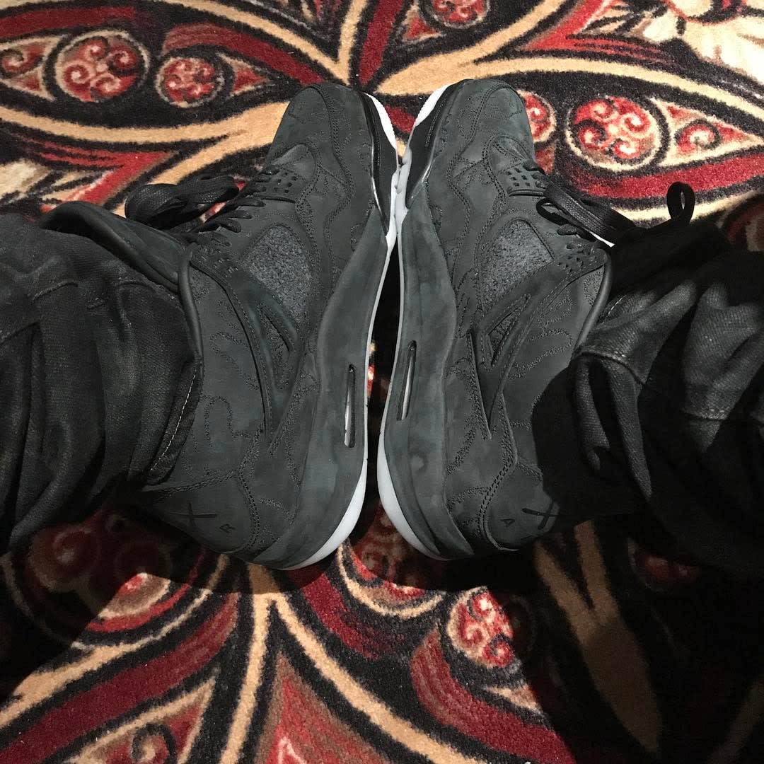 jordan 4 kaws on feet