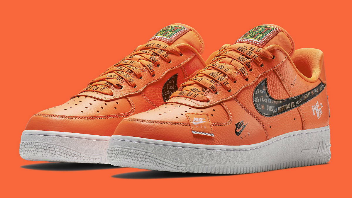 orange and white just do it air force ones