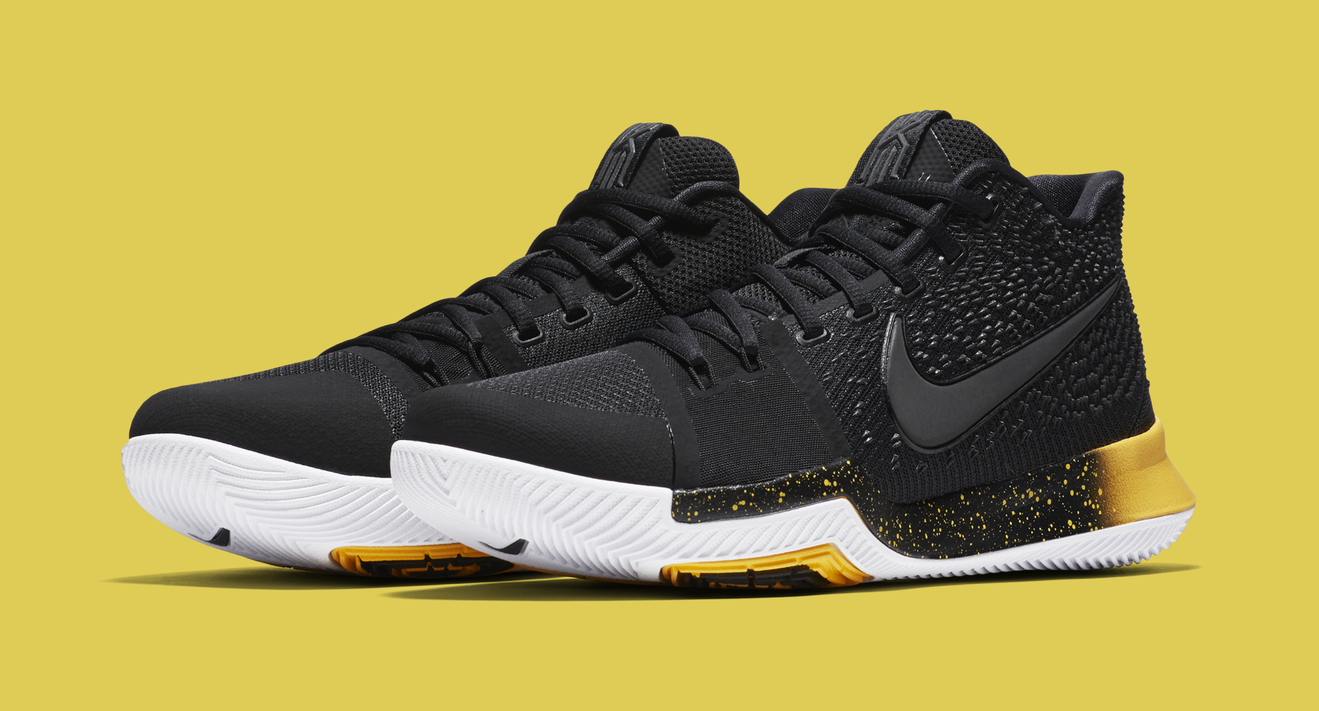 kyrie shoes black and yellow