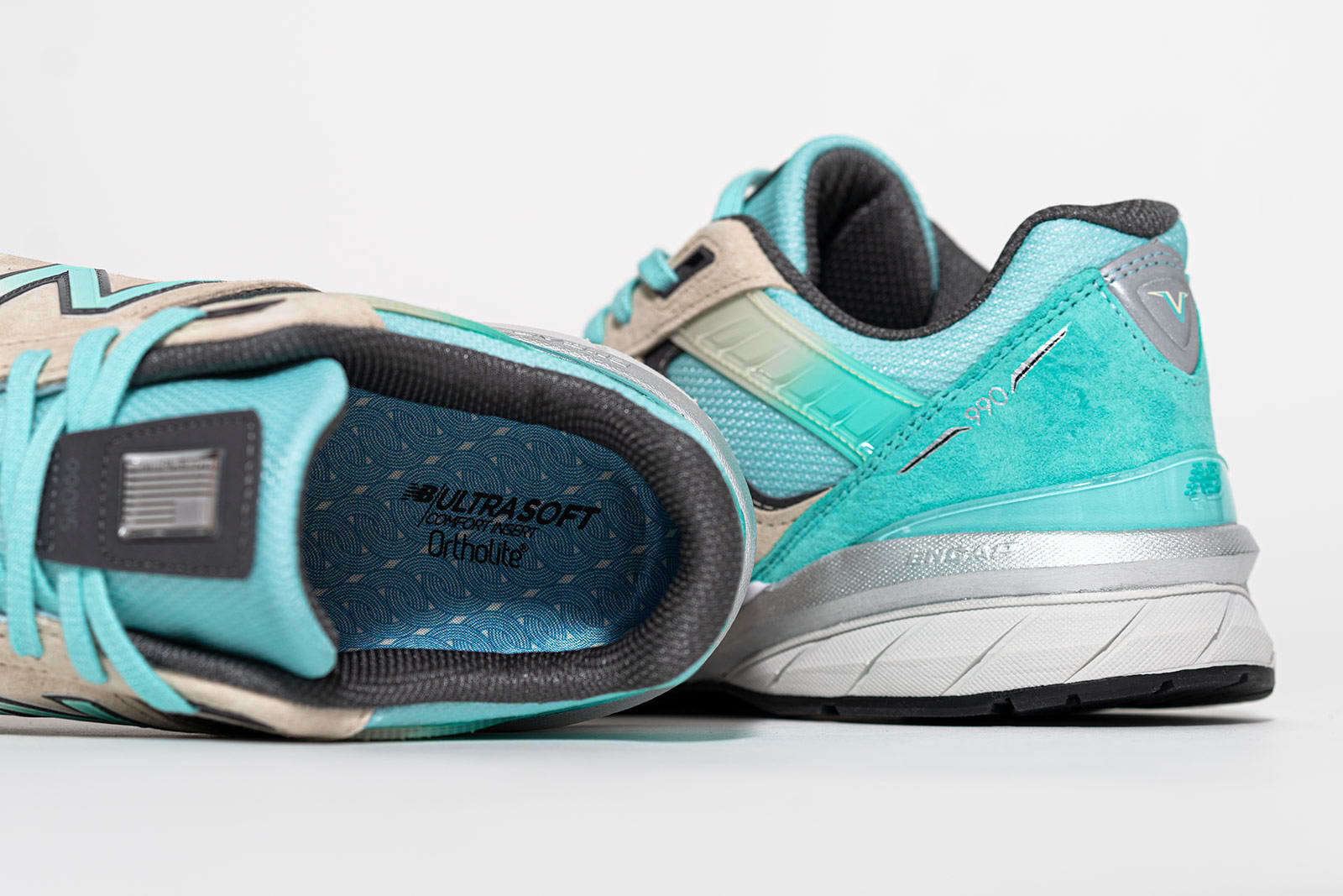 teal new balance 990