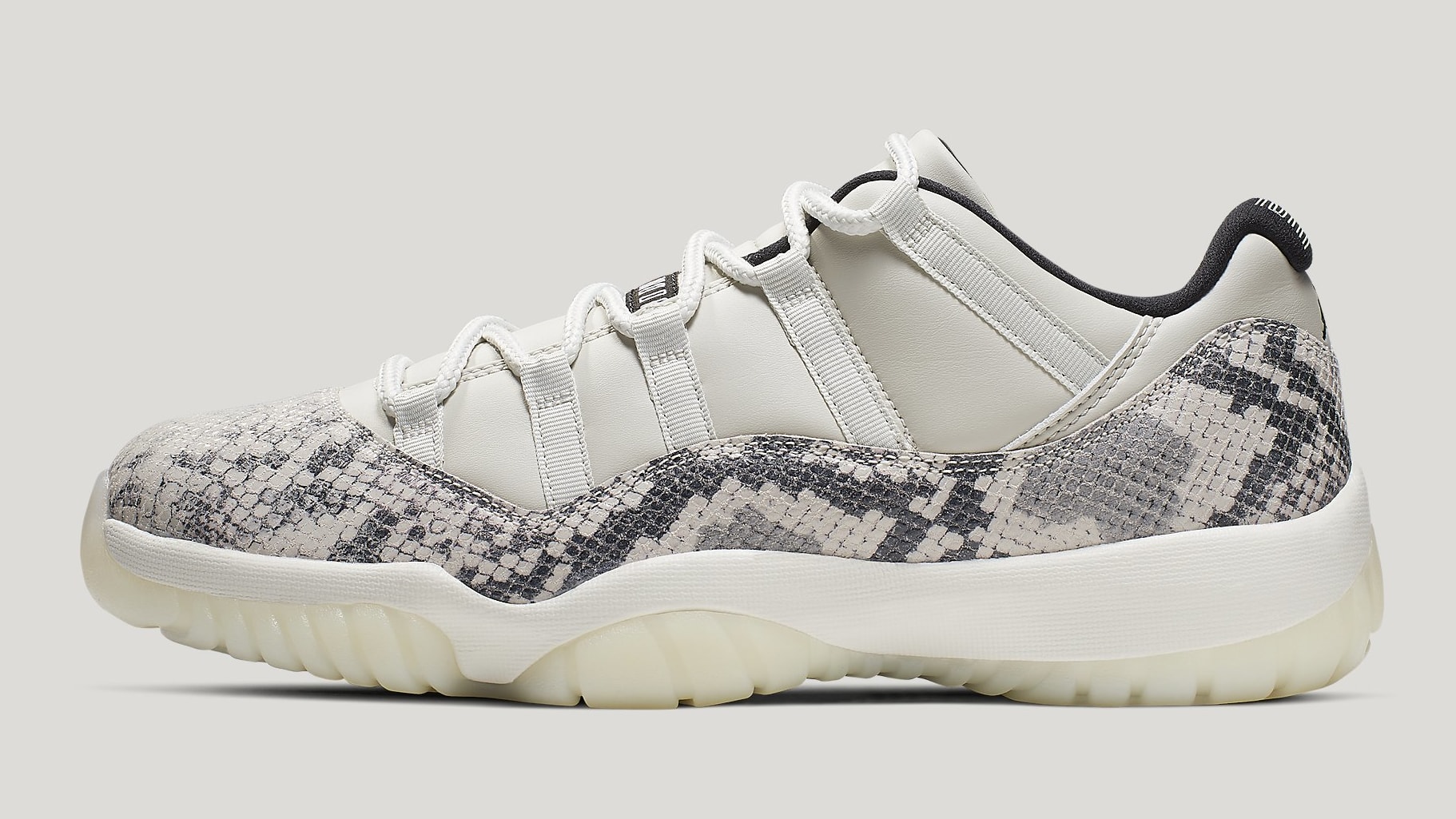 white and grey snakeskin 11s