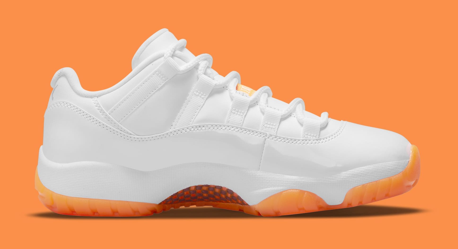 white and orange jordans 11 release date