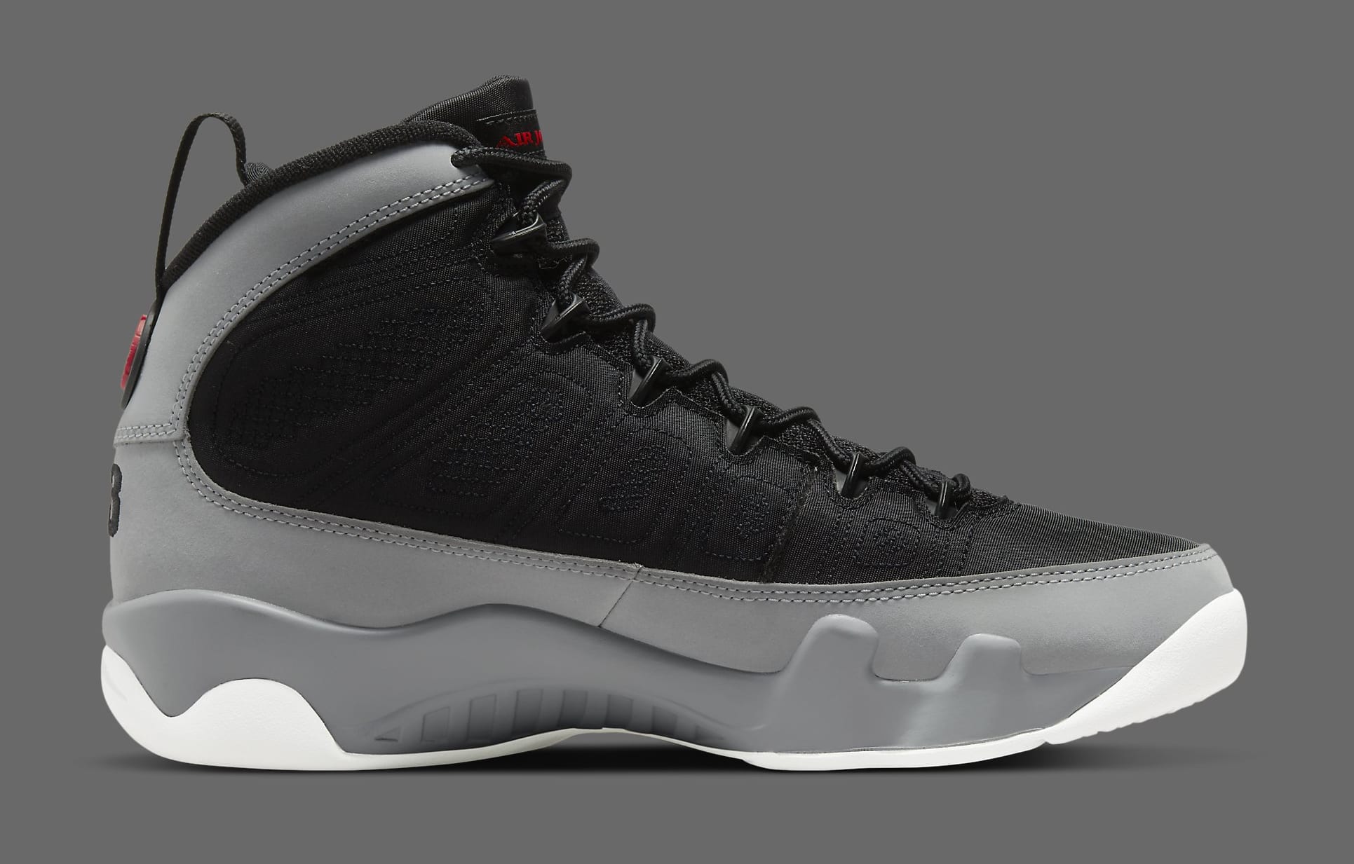 black and gray jordan 9