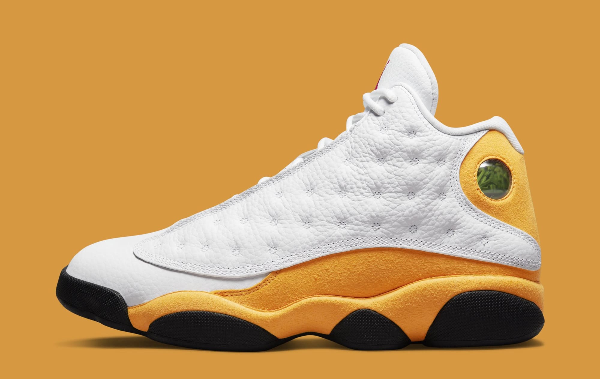 White and gold jordans 13