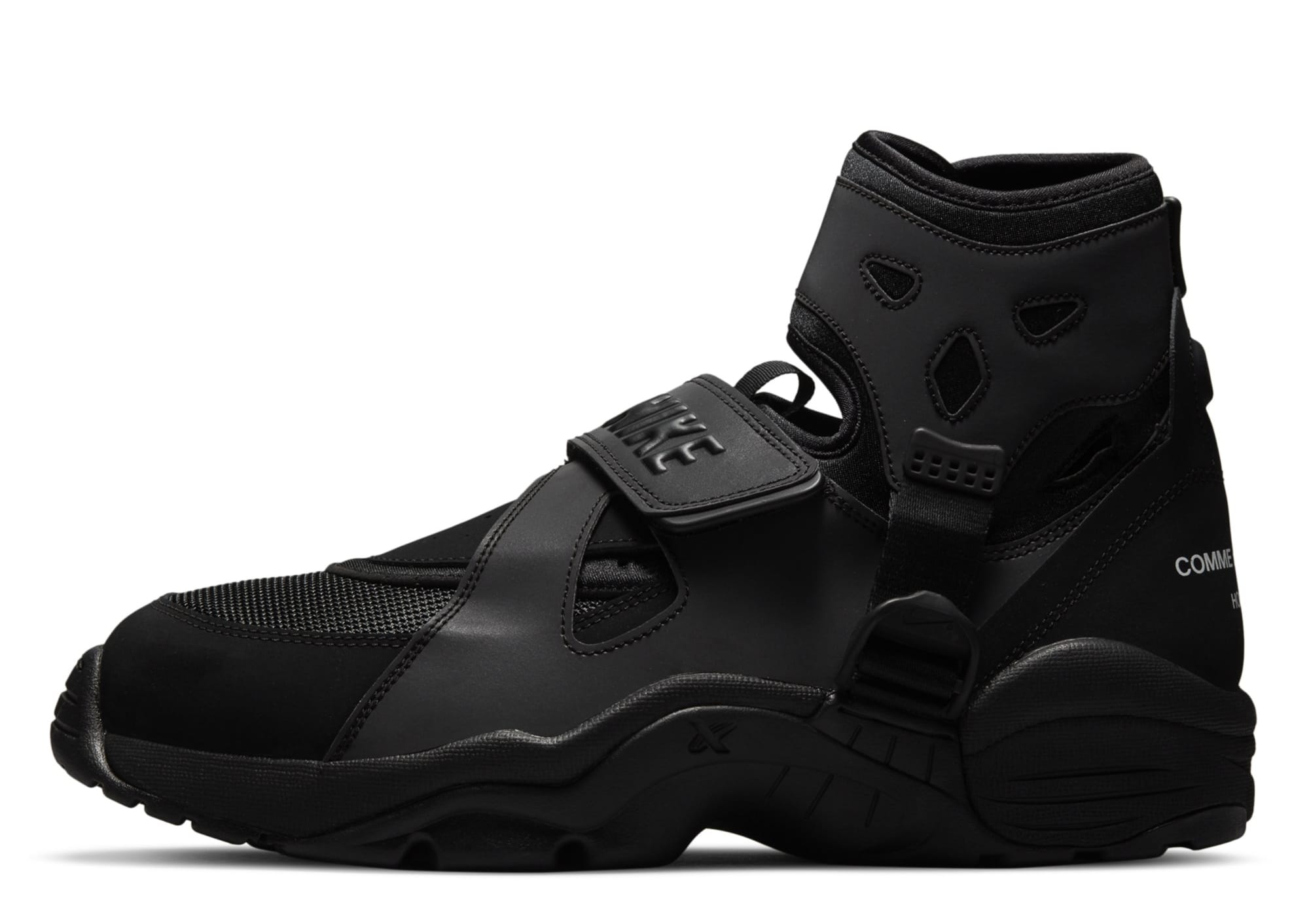 nike carnivore comme des garcons