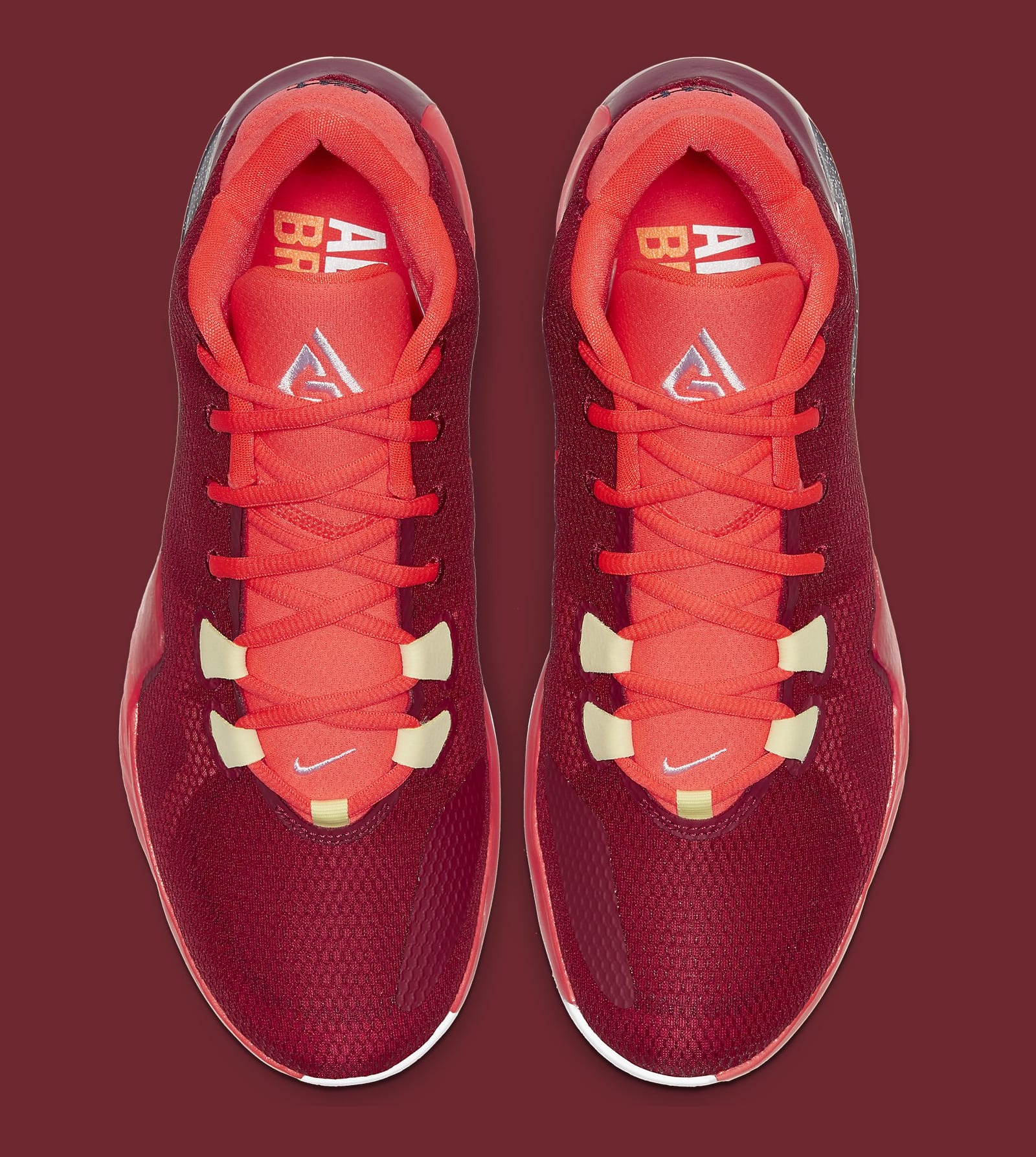 pink giannis shoes